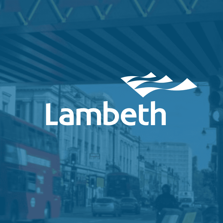 Lambeth logo on top of a faded image of a street with shops and a red bus in motion