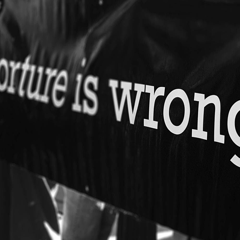 'Torture is wrong' banner