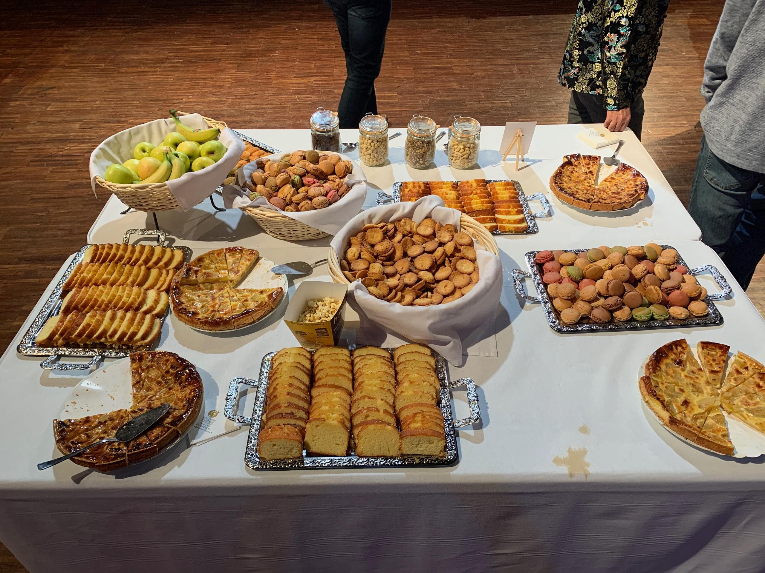 Photograph of a table with lots of cakes on it
