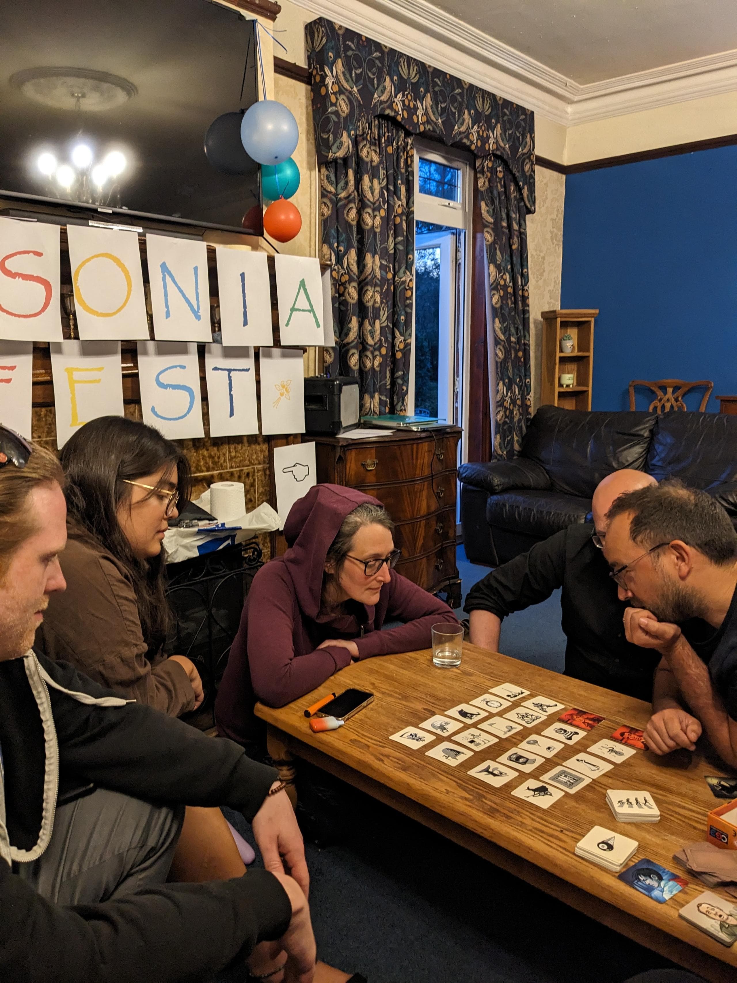 Some of the team playing a round of Codename. 