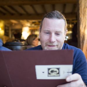 Stephen reading the menu