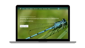 The TVERC website homepage. picture of a blue dragonfly on a leaf with a green background